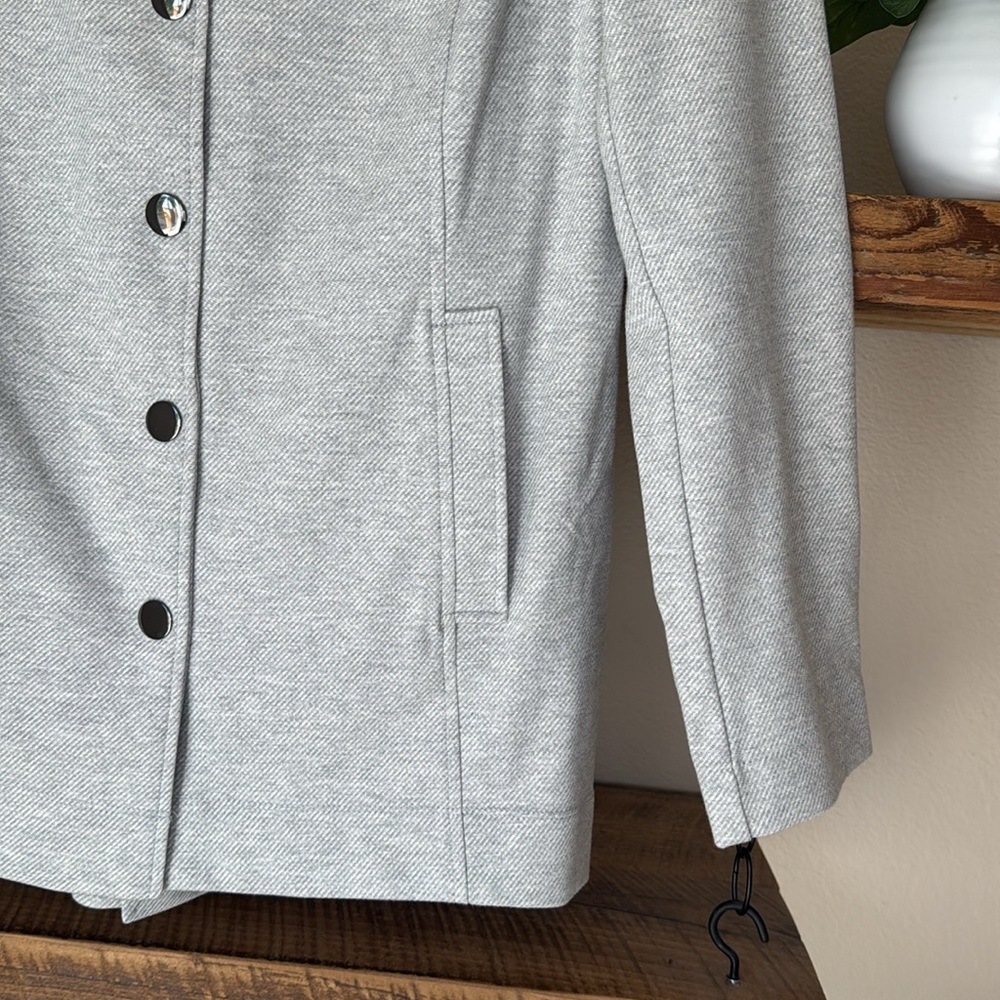 NWOT CAbi Calvary Heather Light Gray Twill
Ponte Snap Closure Jacket, M - Picture 8 of 16